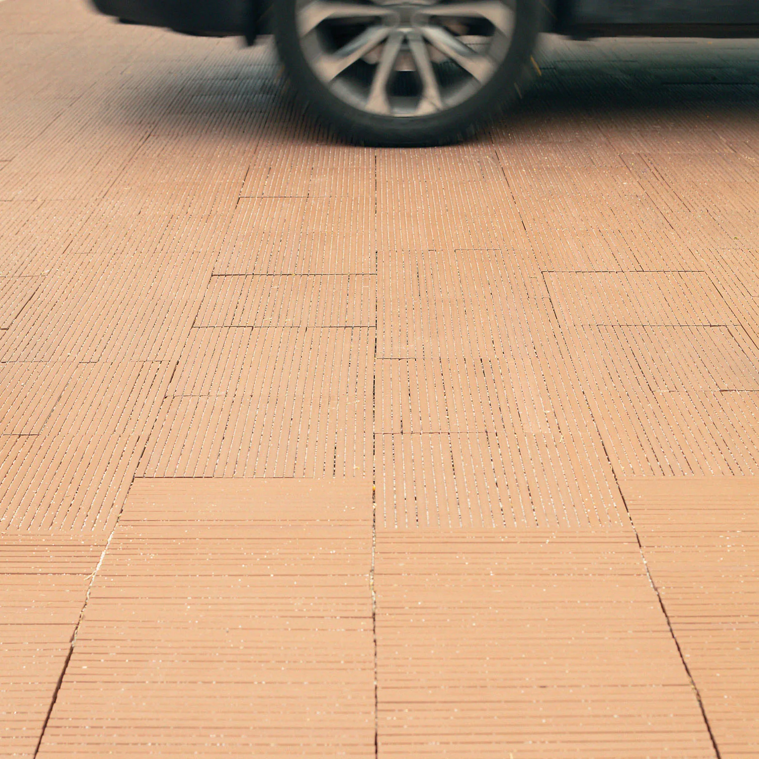 Drainker — Drainker · permeable ceramic paving in red-body stoneware